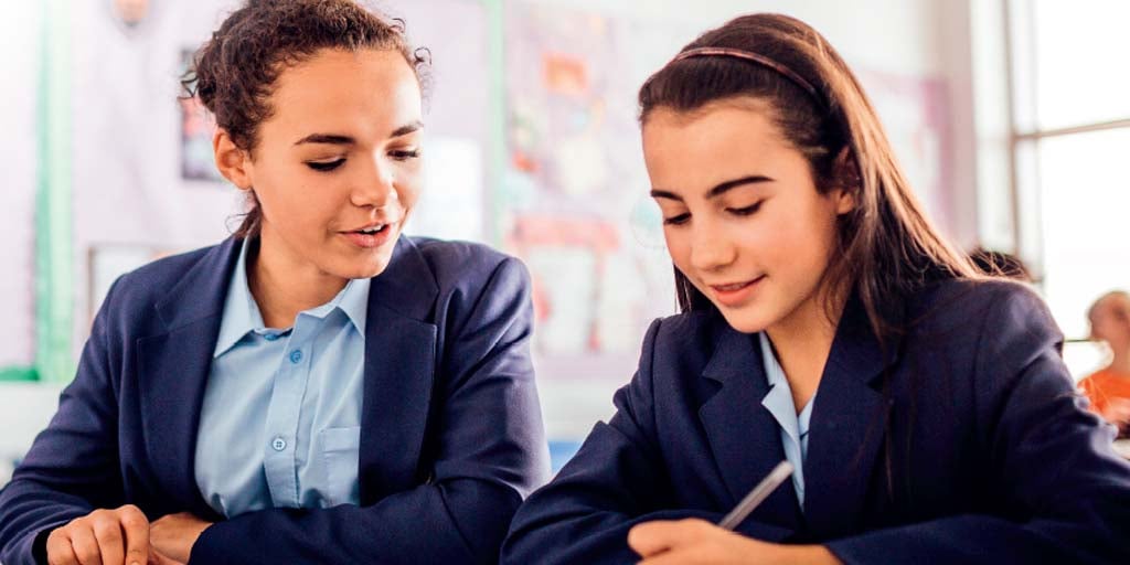 School girls at desk