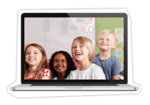 Primary aged children smiling on a laptop screen